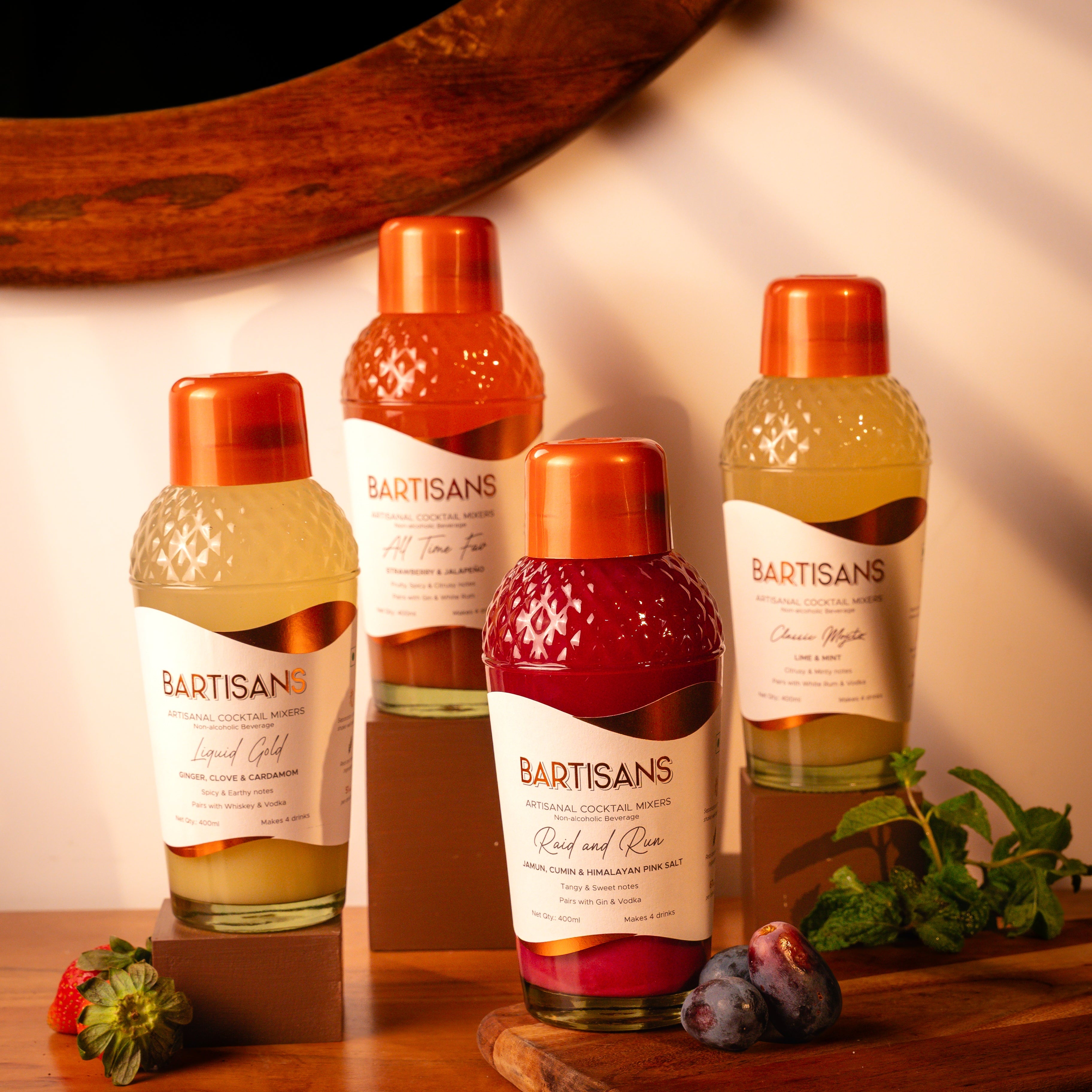  The Mocktail Experience (Makes 16 Drinks) bottles styled with poured cocktails 