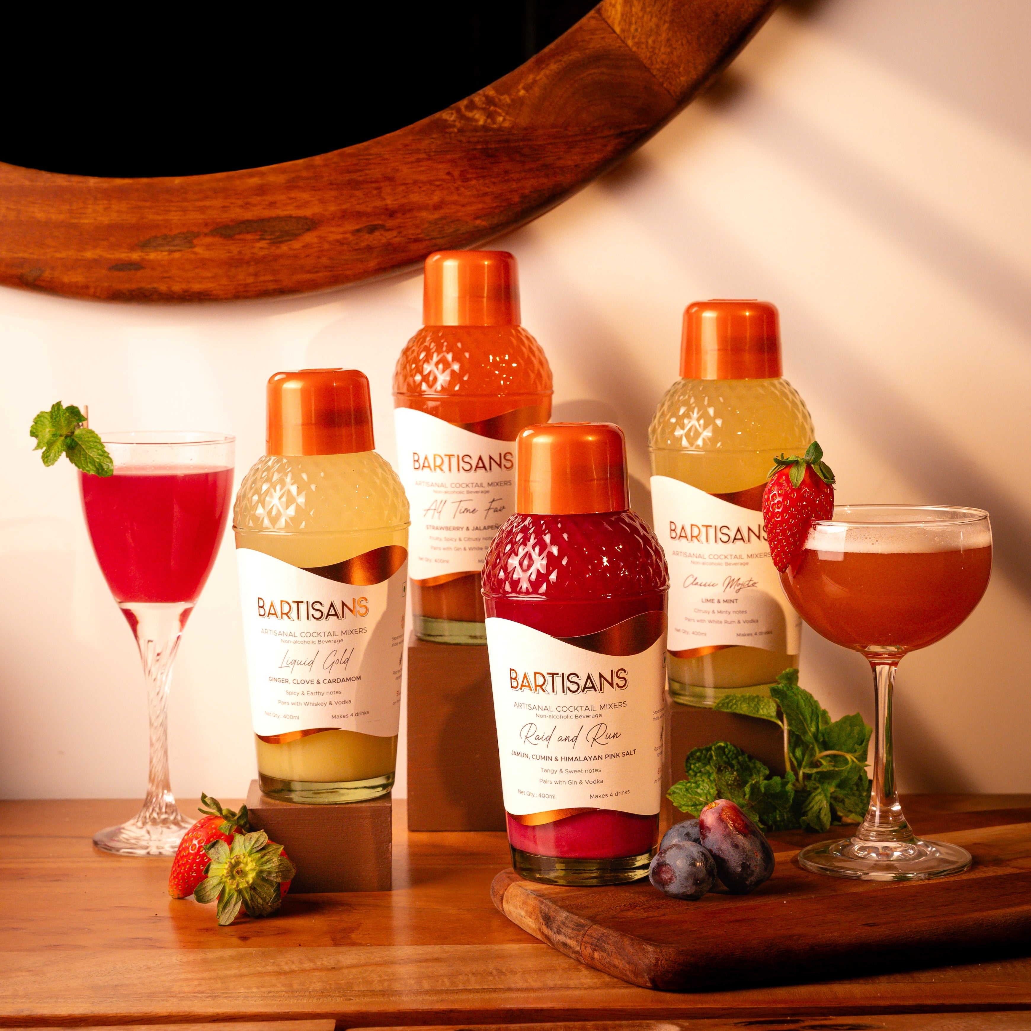  The Mocktail Experience (Makes 16 Drinks) bottles styled with poured cocktails 