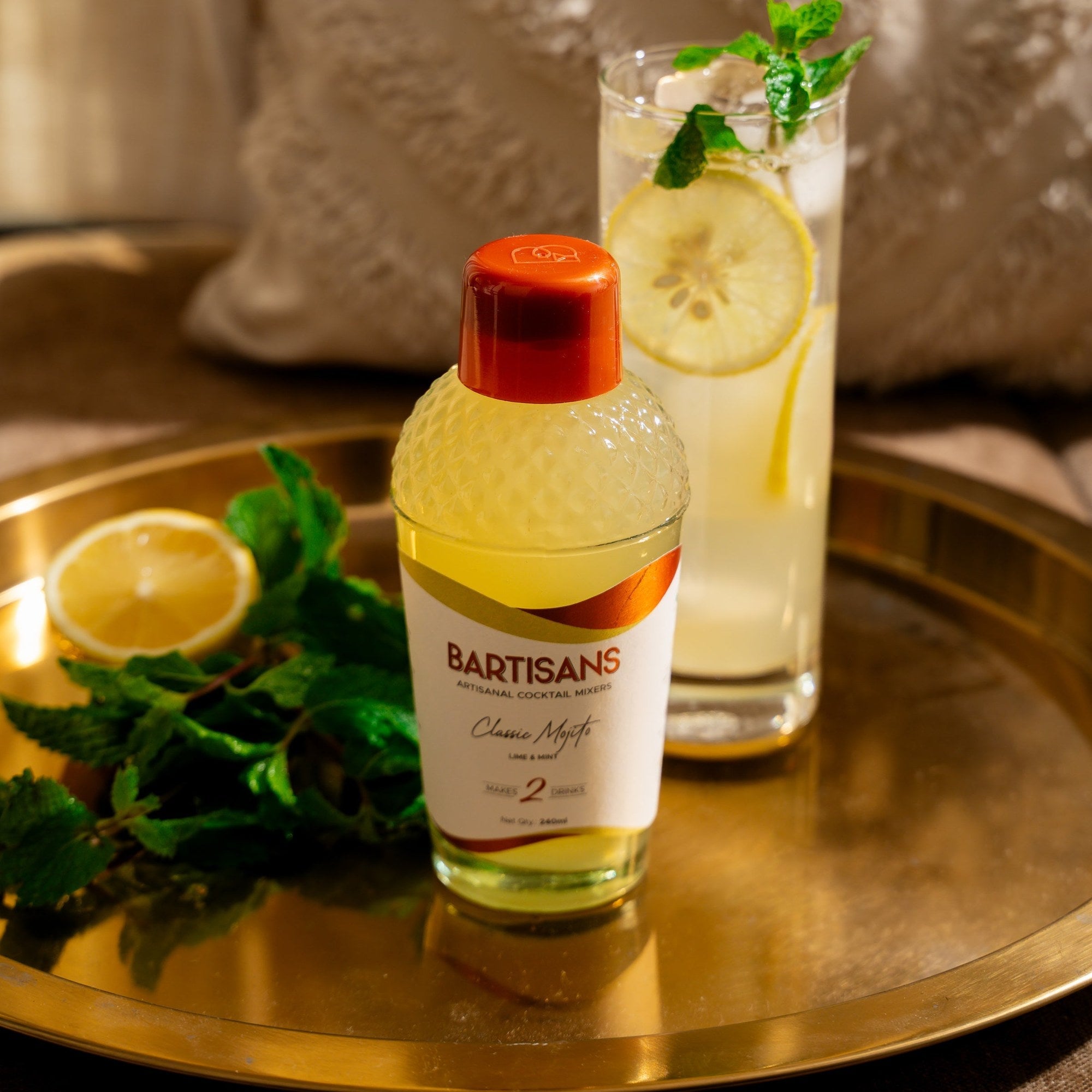  Classic Mojito cocktail mixer bottle styled with a poured cocktail#Serve_2 Drinks 