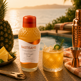 Smoked Pineapple Picante cocktail mixer bottle styled with a poured cocktail#Serve_4 Drinks