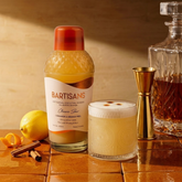 Classic Sour cocktail mixer bottle styled with a poured cocktail#Serve_4 Drinks