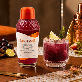 Raid and Run cocktail mixer bottle styled with a poured cocktail